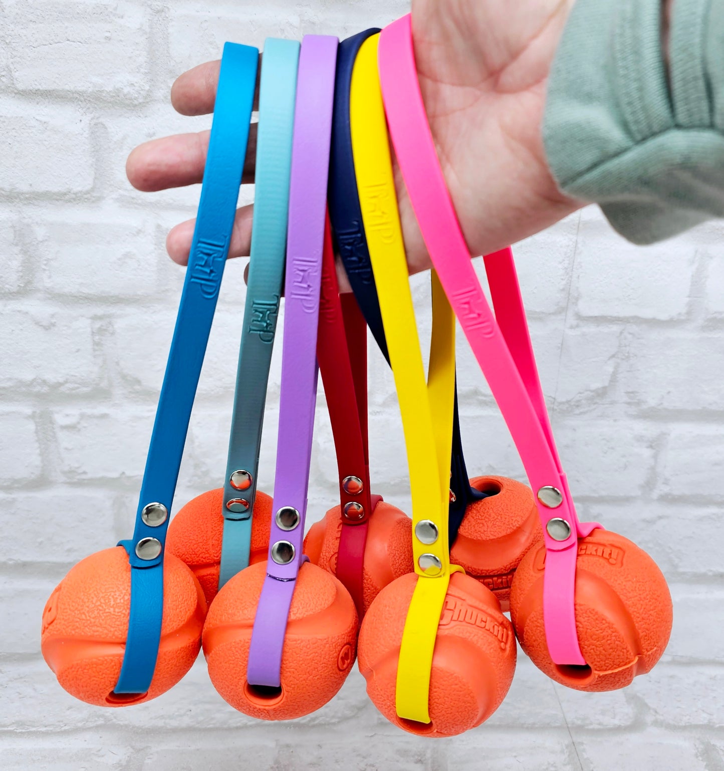 Chuck-It® Ball on Waterproof BioThane® Tug & Launcher Toy